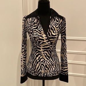 Leopard print stretch long sleeve blouse. Size small